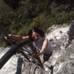 (32) Cathie Climbing up Mayan Temple at Tikal in Guatemala