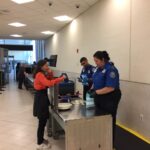 (53) TSA Checking Cathie's Sand at Ft. Myers Airport