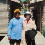 (54) Cathie and Her Favorite Belize Snorkeling Guide Chris in Devo Hat