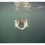 (74) Cathie Swimming Underwater at a Pool at Hidden Valley Inn, Belize Large