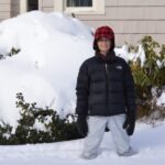 Cathie - Standing the Large amount of Snow that Fell when she first went on a her Jamaica Yoga Retreat that Peter had to deal with Medium