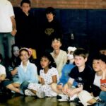 Devotion Primary Exteded Day Program - Cathie with a group of kids