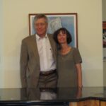 Peter and Cathie in Front of a Painting by our Friend Pat Monson Medium