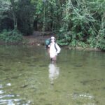 Travel - Cathie Wading to ATM Cave in Belize Medium