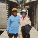 Travel - Cathie and Her Favorite Snorkeling Guide Chris at Blackbird Caye in Belize Medium