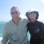 Travel - Peter and Cathie on Snorkeling Boat at Blackbird Caye in Belize Large